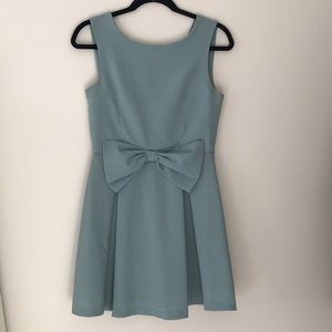 Sage-y green mini dress with front bow detail